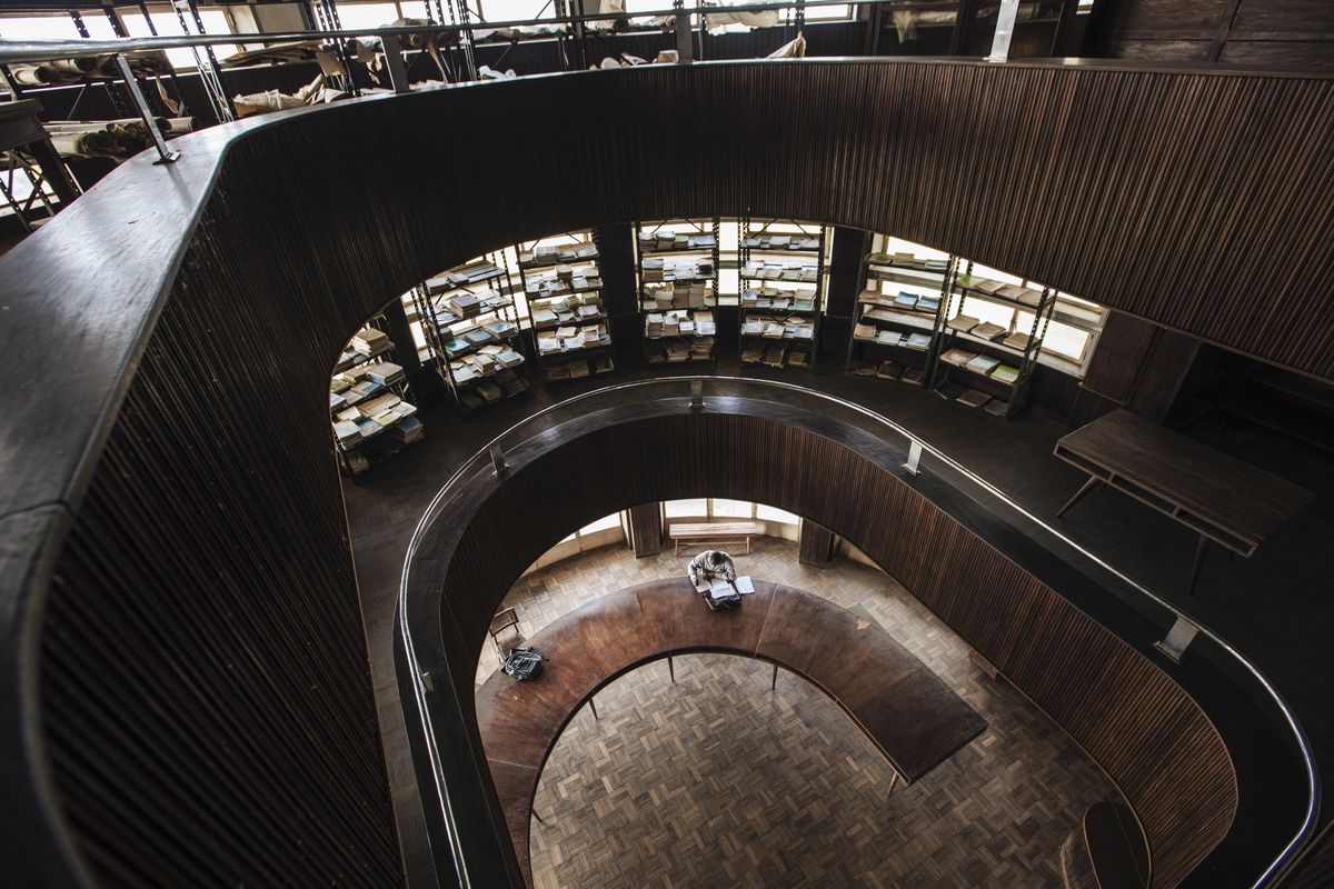 A man reads inside the Yangambi Library.