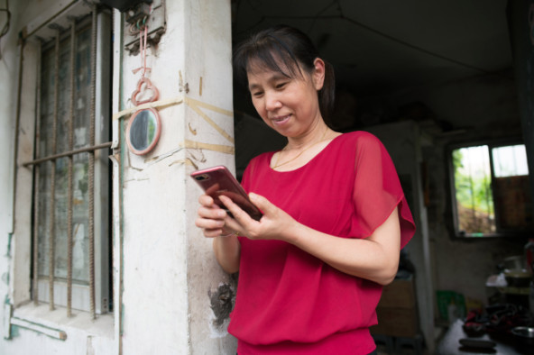 Zhang Yonghong found it easy to get work sewing at shoe factories when she first left her village in central China in the 1990s. (Credit: Shanghai 808 Studio)
