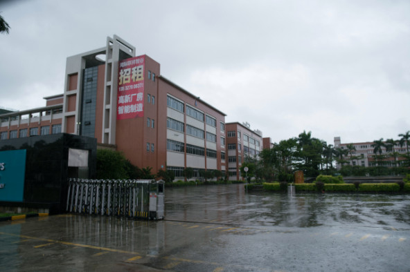 The former site of the United Shoe factory has signs looking for a new tenant after the company's boss moved operations to Cambodia. (Credit: Shanghai 808 Studio)