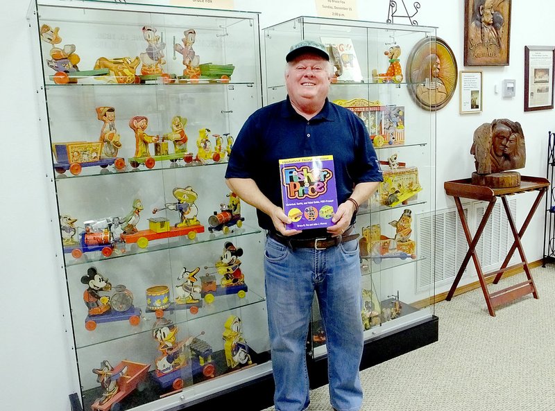 NWA Democrat-Gazette / LYNN ATKINS Bruce Fox will be signing copies of his second book about Fisher-Price toys after he speaks at 2 p.m. Dec. 15 at the Bella Vista Historical Museum. story.lead_photo.caption