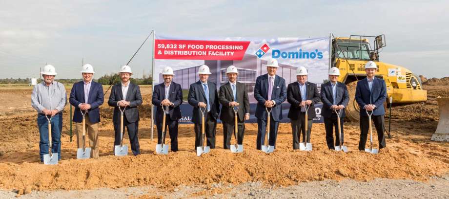 Domino’s officially broke ground on its supply chain center at 900 Igloo Road in Katy on Thursday, Dec. 12. Representatives and leadership from Domino’s, ARCO Design/Build and National Property Holdings participated in the ceremony. Photo: Courtesy Domino's