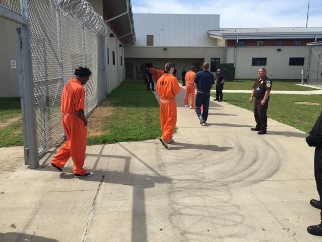 Inmates arrive at a maximum-security prison in Fort Madison.