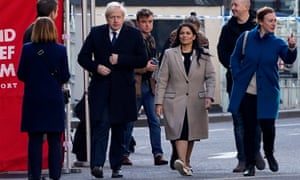 Boris Johnson and the home secretary Priti Patel at the scene of the London Bridge stabbings.