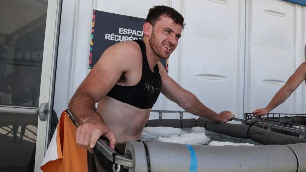 Hugo Keenan in the ice bath after the rugby sevens Olympic qualifier against Germany in July. Photo: Billy Stickland/Inpho
