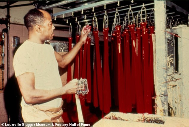 Quinton Jackson is pictured dipping bats in an undated photo