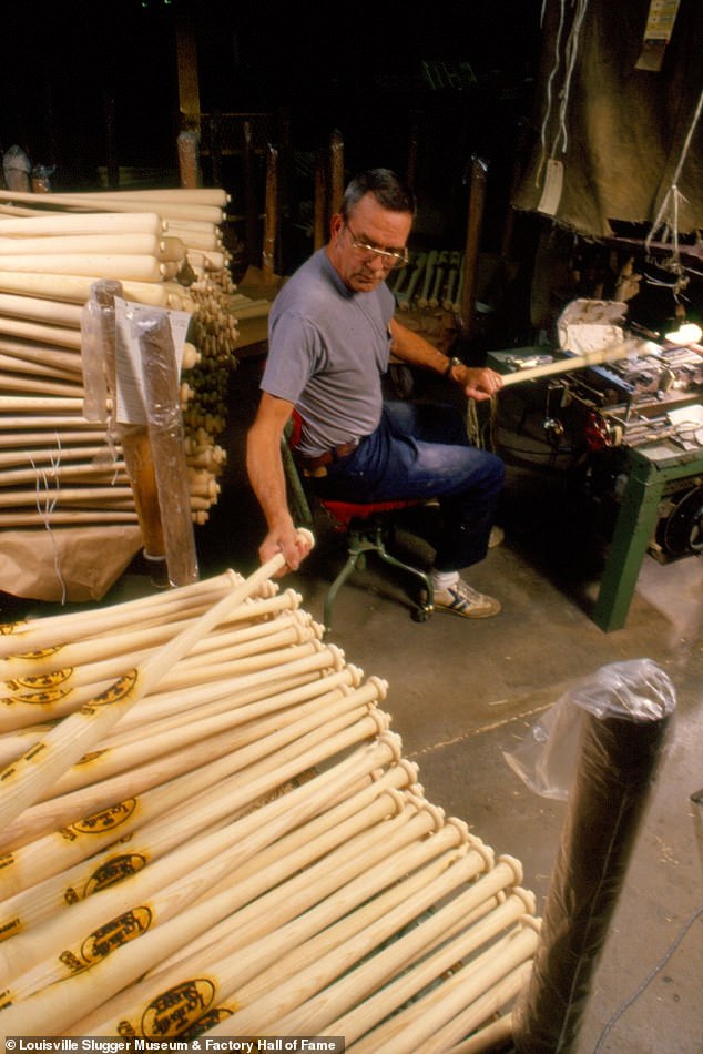 An unidentified employee is seen branding bats. Rena Jenkins, a longtime current employee who began at the company in 1977 instantly recognized a former employee by the name of Georgia Hines. She told DailyMail.com: '...she was a little bitty lady. She probably weighed maybe 110 pounds fully clothed...but she could engrave a bat. Back then, that was her job. She was the only one that did that back then'