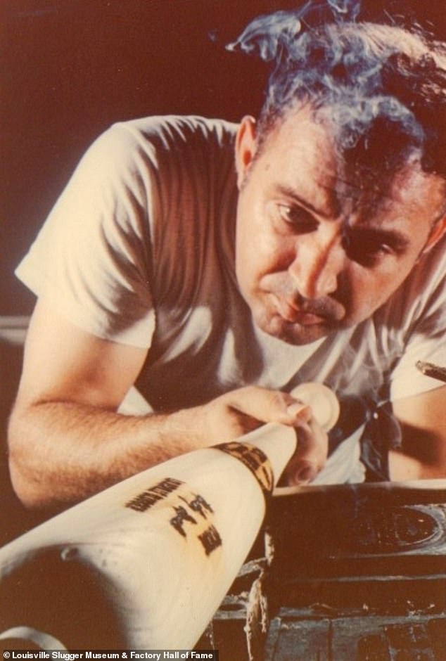 Employee Arthur Peyton branding a bat in an undated photo. Today, Louisville Sluggar churns out 1.8 million bats per year