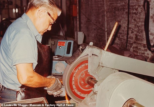 Paula Dyer, identified her aunt Polly and uncle John 'Buck' Basham (pictured polishing a golf club head) in the trove of pictures on display at the Louisville Sluggar Museum. She told DailyMail.com 'They would never be a minute late. They never missed a day. They were proud to work there, yes. It was hard work; they never complained too much about it'