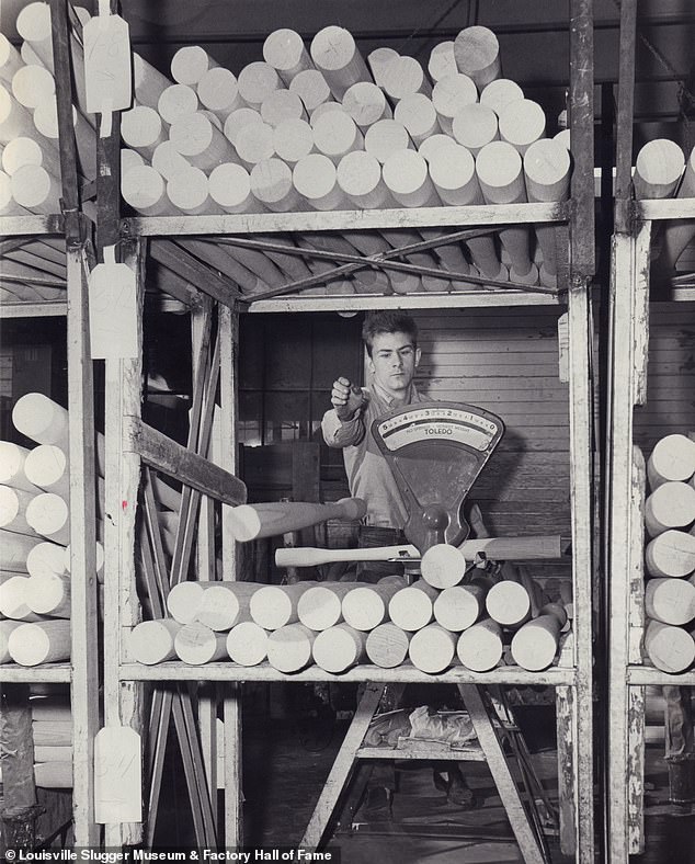 An undated photo of an employee weighing roughouts before they are cut down to the shape of a specific baseball bat model. Baseball bat cores used to be made of Ash wood but have since been changed to Maple wood after Barry Bonds broke the single-season home run record using Maple bats in 2001