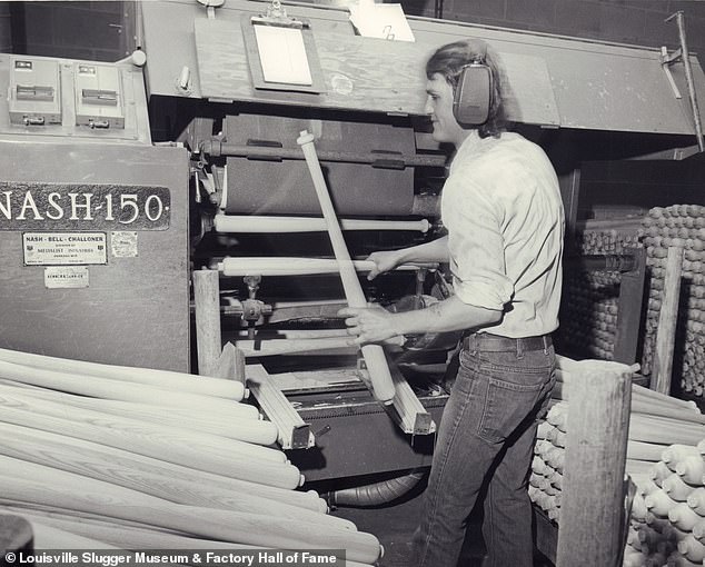 Employee operating sanding machine