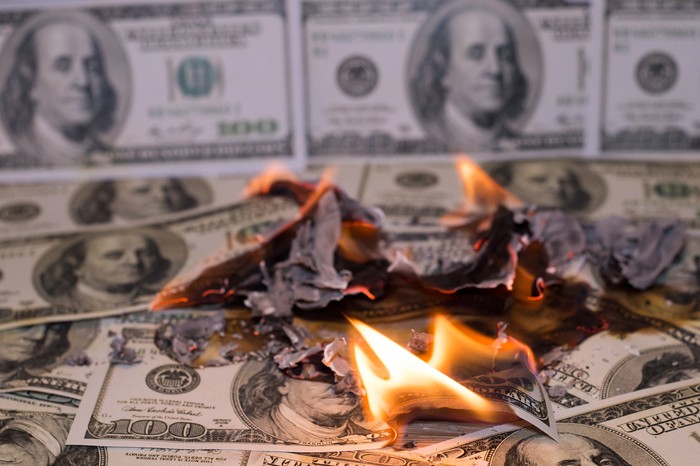 U.S. currency burning.