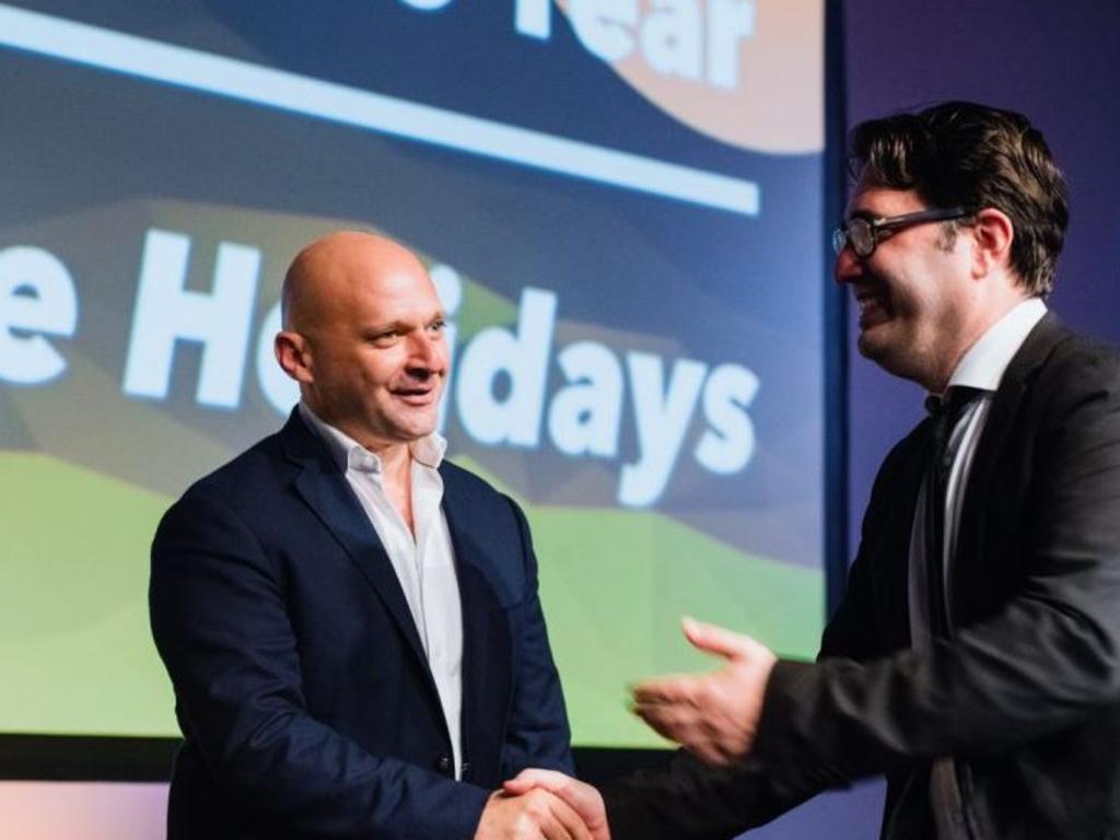Excite Holidays co-founder George Papaioannou accepting Travel Weekly’s Wholesaler Of The Year Award. Picture: Facebook