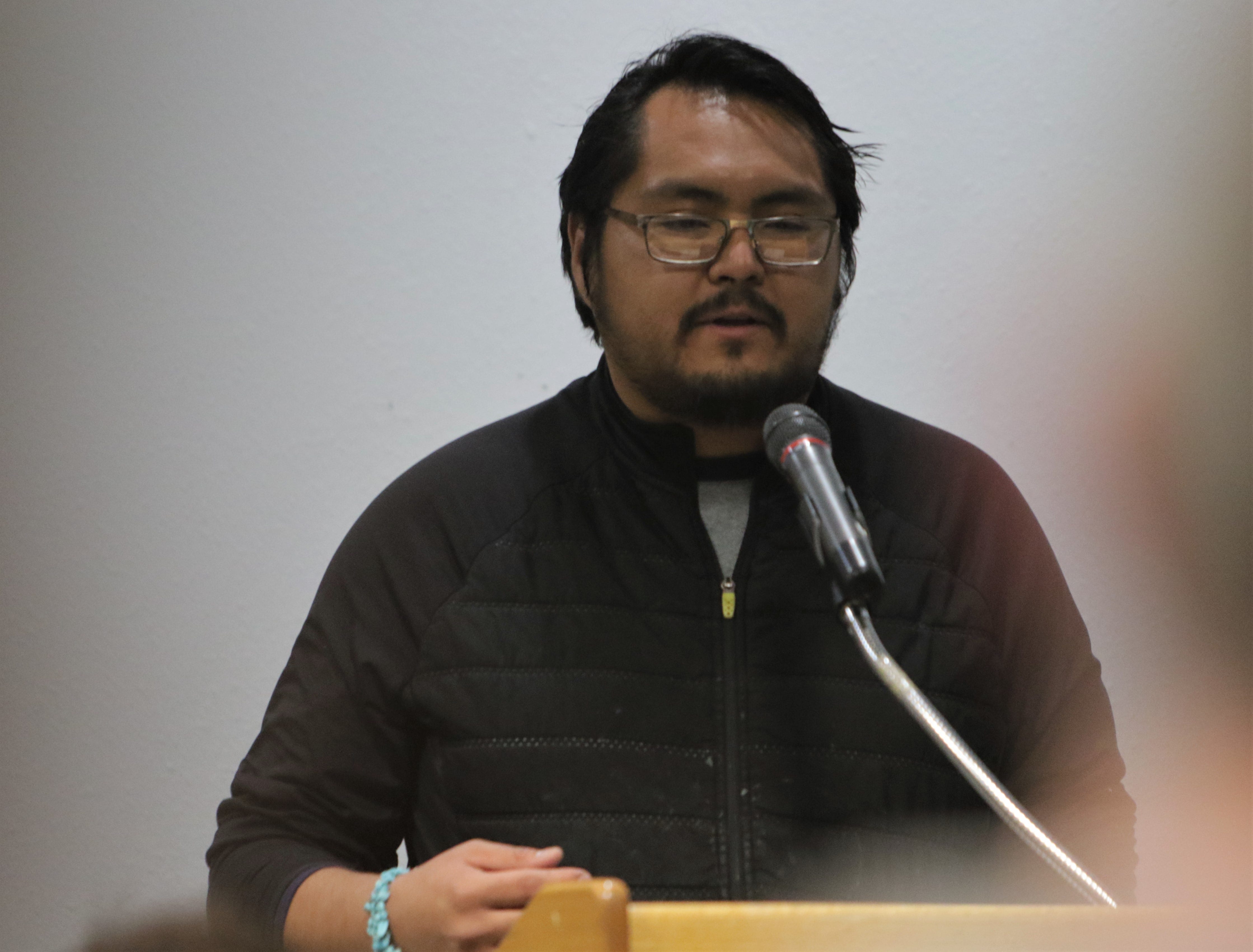 Jathiel George asks the PRC not to apply the Energy Transition Act to the San Juan Generating Station abandonment case during a public hearing, Monday, Jan. 6, 2020, at San Juan College.