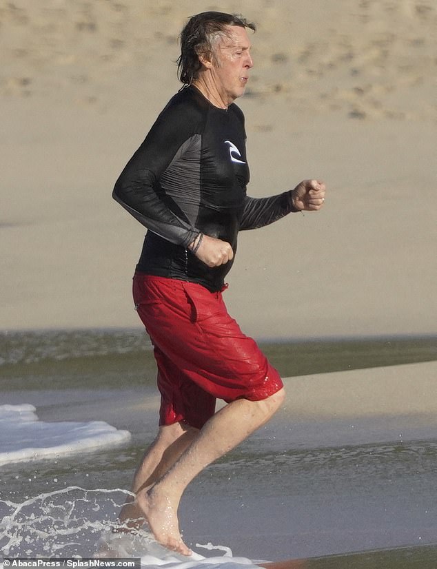 Workout: Sir Paul McCartney went for another dip in the azure waters of St Barts on Monday