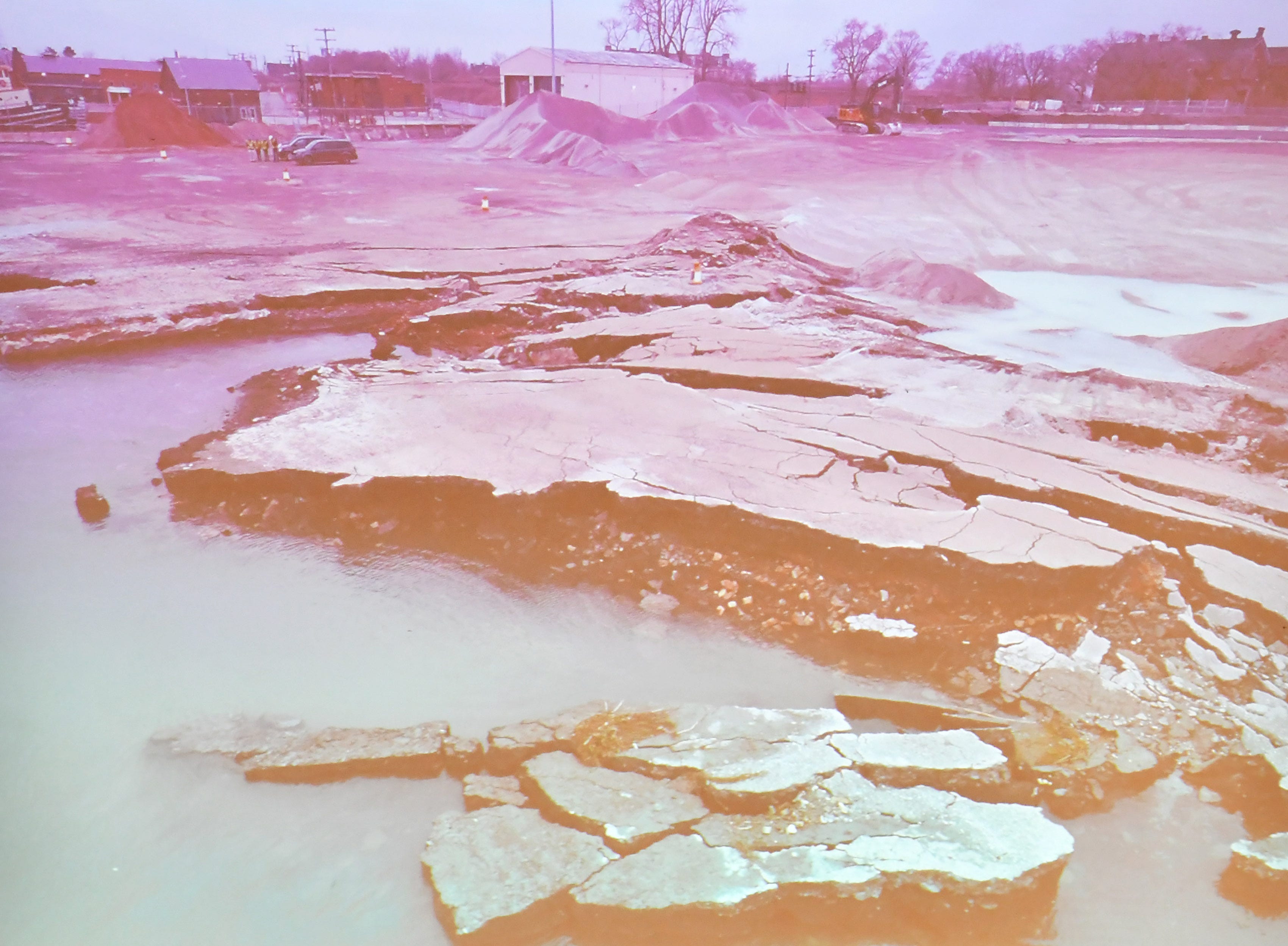 A photo of the collapse shown at the community meeting in response to the Detroit Bulk Storage collapse into the Detroit River at the Cass Corridor Commons in Detroit on Dec. 12, 2019.