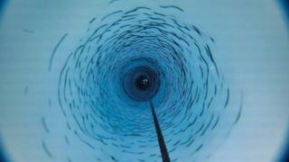 Bore hole through the ice