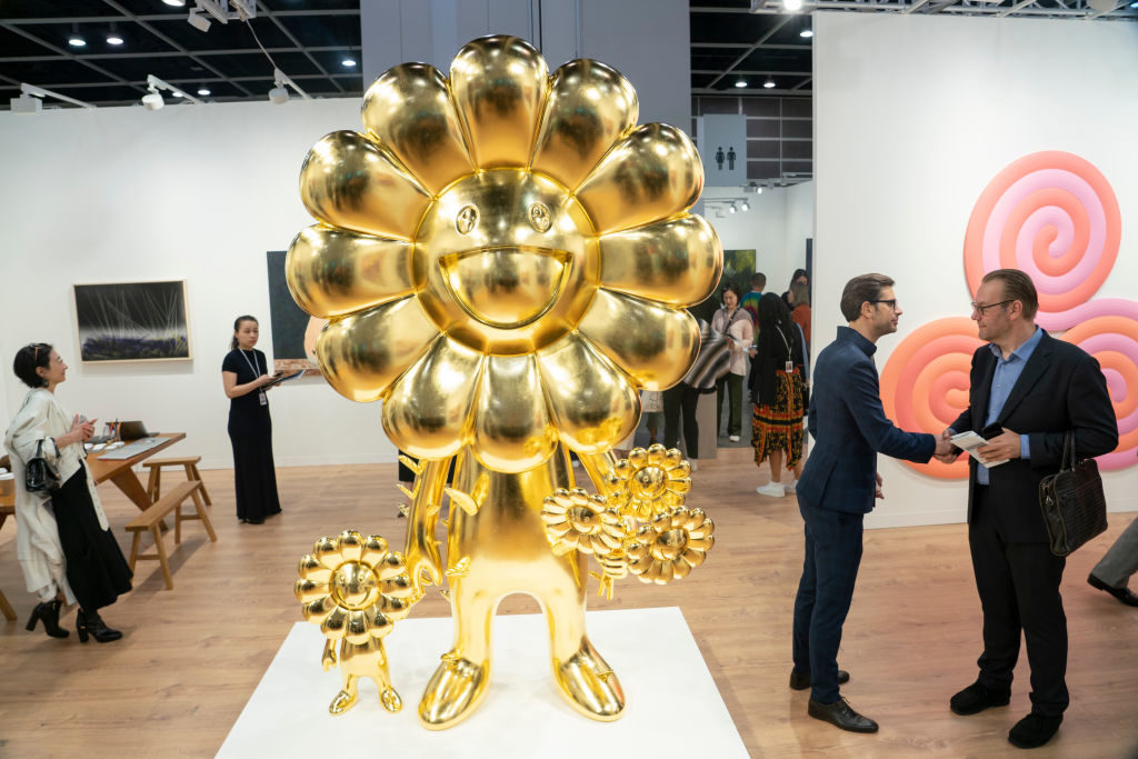 Visitors viewing artwork at Art Basel Hong Kong on March 27, 2019. (Photo by Theodore Kaye/Getty Images)