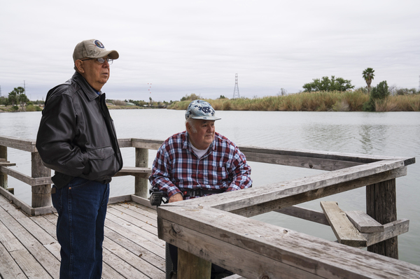 Cousins Rey Anzaldua (left) and Cavazos own a rustic campground in Mission. The government wants to put the wall and a wide patrol zone along the north end of their property. They worry it will drive away his tenants, who may not want to be walled off from the rest of Texas.