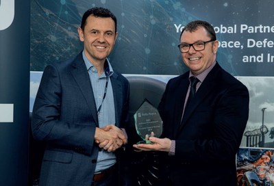 Belcan's Keith Matthews (left) receives the 2019 Rolls-Royce GBS Procurement Supplier of the Year Award from Rolls-Royce's Dean Fell (right). Belcan was recognized for its outstanding service to Rolls-Royce, and is one of only two suppliers to receive this prestigious award. Rolls-Royce recognized the key achievements Belcan made in cost reduction, quality, and delivery excellence for the company throughout the year. Belcan's Keith Matthews (left) receives the 2019 Rolls-Royce GBS Procurement Supplier of the Year Award from Rolls-Royce's Dean Fell (right). Belcan was recognized for its outstanding service to Rolls-Royce, and is one of only two suppliers to receive this prestigious award. Rolls-Royce recognized the key achievements Belcan made in cost reduction, quality, and delivery excellence for the company throughout the year.