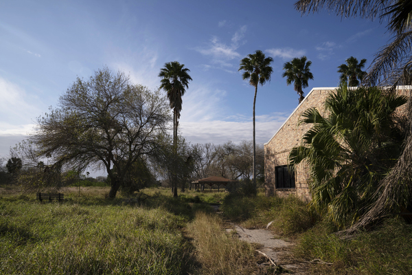 Grass and shrubs take over the closed Fort Brown Memorial Golf Course in Brownsville, Texas. The course was original built by the University of Texas system but the facilities are on the south side of the border wall.