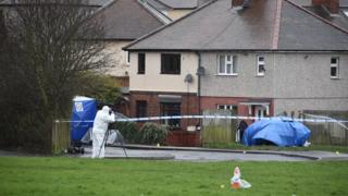 Forensic teams at the scene