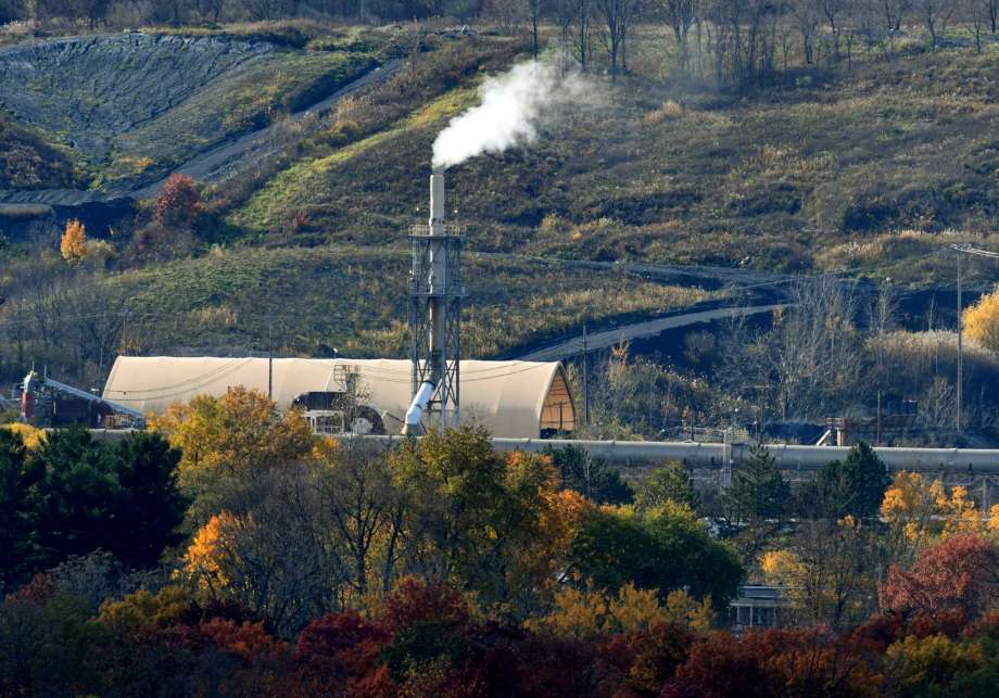 Emissions rise from the Norlite plant on Wednesday, Nov. 7, 2018, in Cohoes, N.Y. Owners of the state's only commercial hazardous waste incinerator are announcing a $30 million project to upgrade pollution control equipment. (Will Waldron/Times Union) Photo: Will Waldron, Albany Times Union