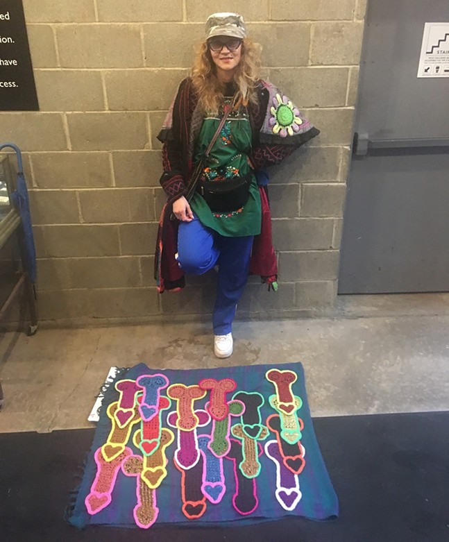 Fiber artist Olek poses their crocheted penises during a performance stunt at the Mattress Factory, Feb. 12 - PHOTO: OLEK