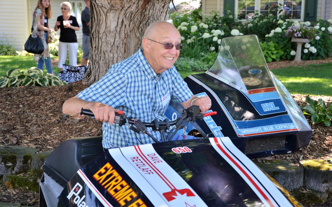 Team Frustration bus and truck driver Tude Westerberg sits on one of the ace sleds during the Team Frustration Reunion last summer in Detroit Lakes. Westerberg was one of many contributors to Todd Simison's Hall of Fame presentation. Submitted photo