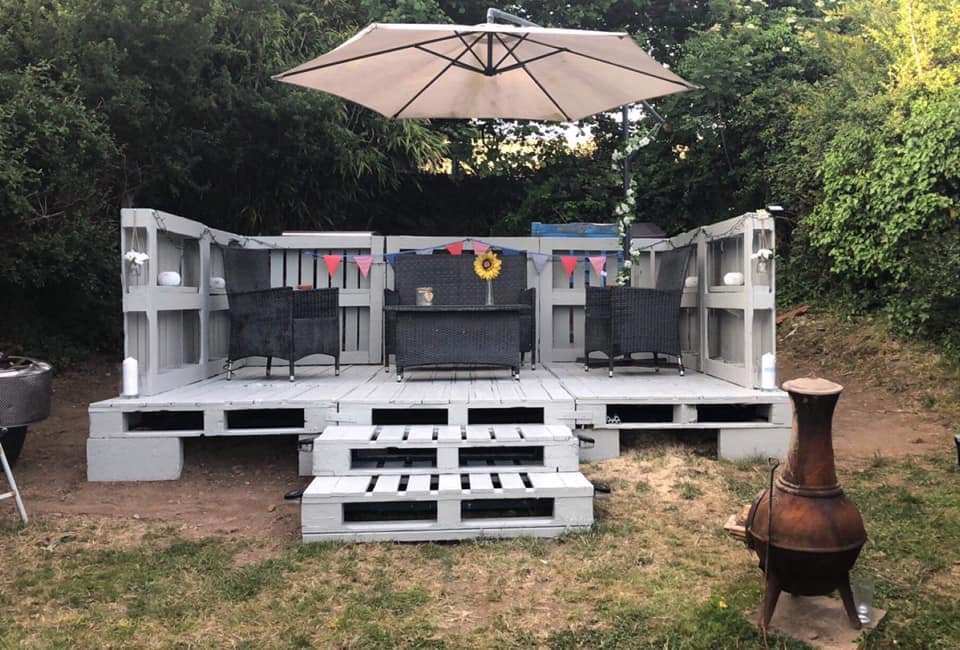 A woman shared how she transformed her garden and made a pretty decking for £27