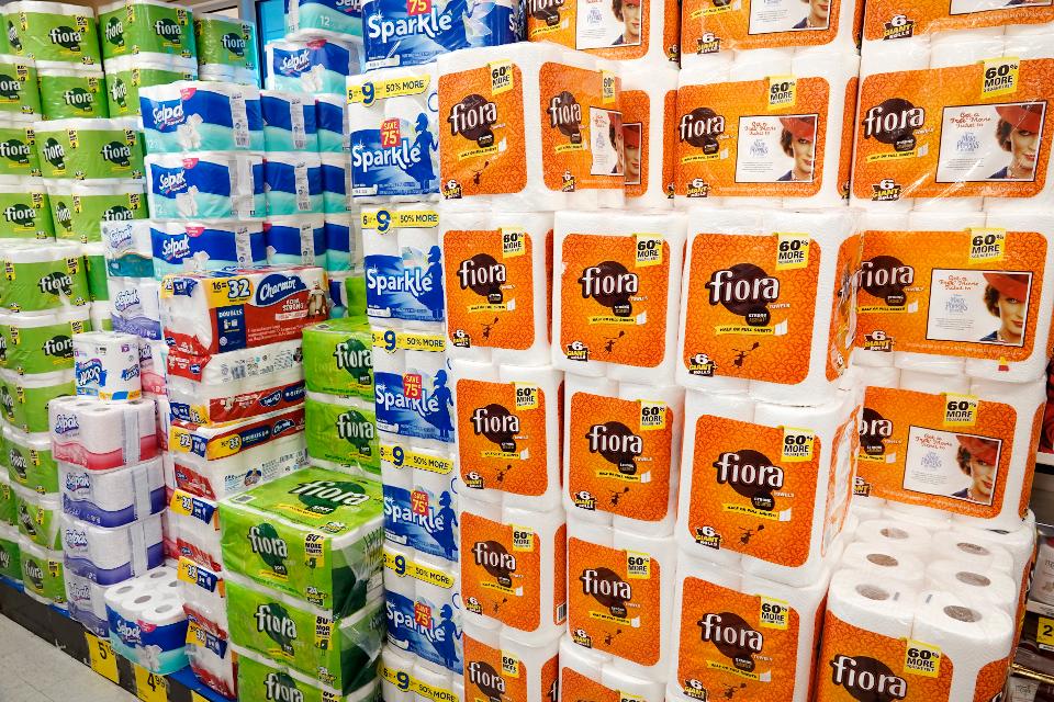 CVS Pharmacy, stacked packaged toilet paper rolls