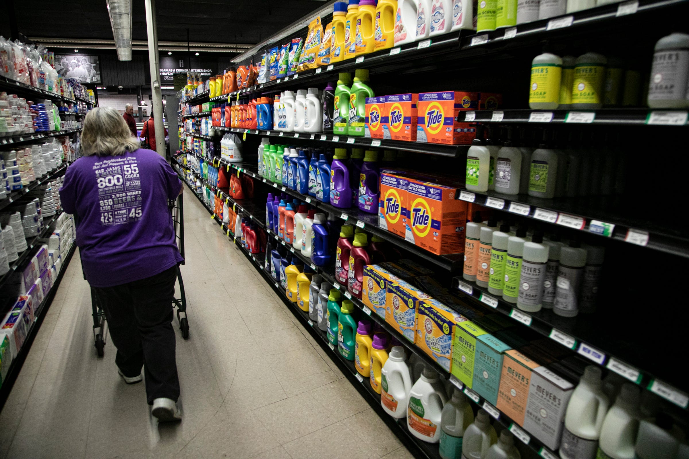 Diane Strauss, 55, of Warren fills online grocery orders at Holiday Market in Royal Oak Tuesday, March, 17, 2020. Online grocery orders at the store have seen an uptick since the Coronavirus threat. 