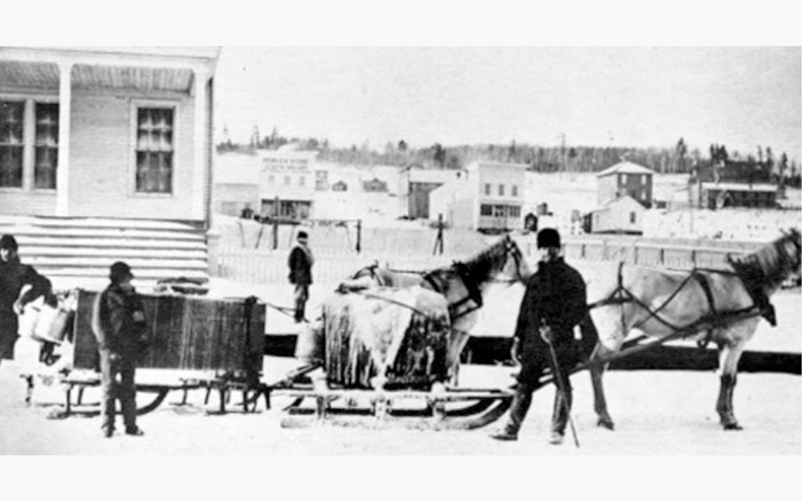 Camille Poirer, inventor of the Duluth pack, photographed in 1870 next to his sleigh, used to transport hogsheads of fresh water to local homes and businesses. (Photo courtesy of the Duluth Public Library)