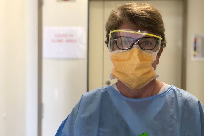 Bunbury healthcare workers A healthcare worker wearing protective glasses and mask.