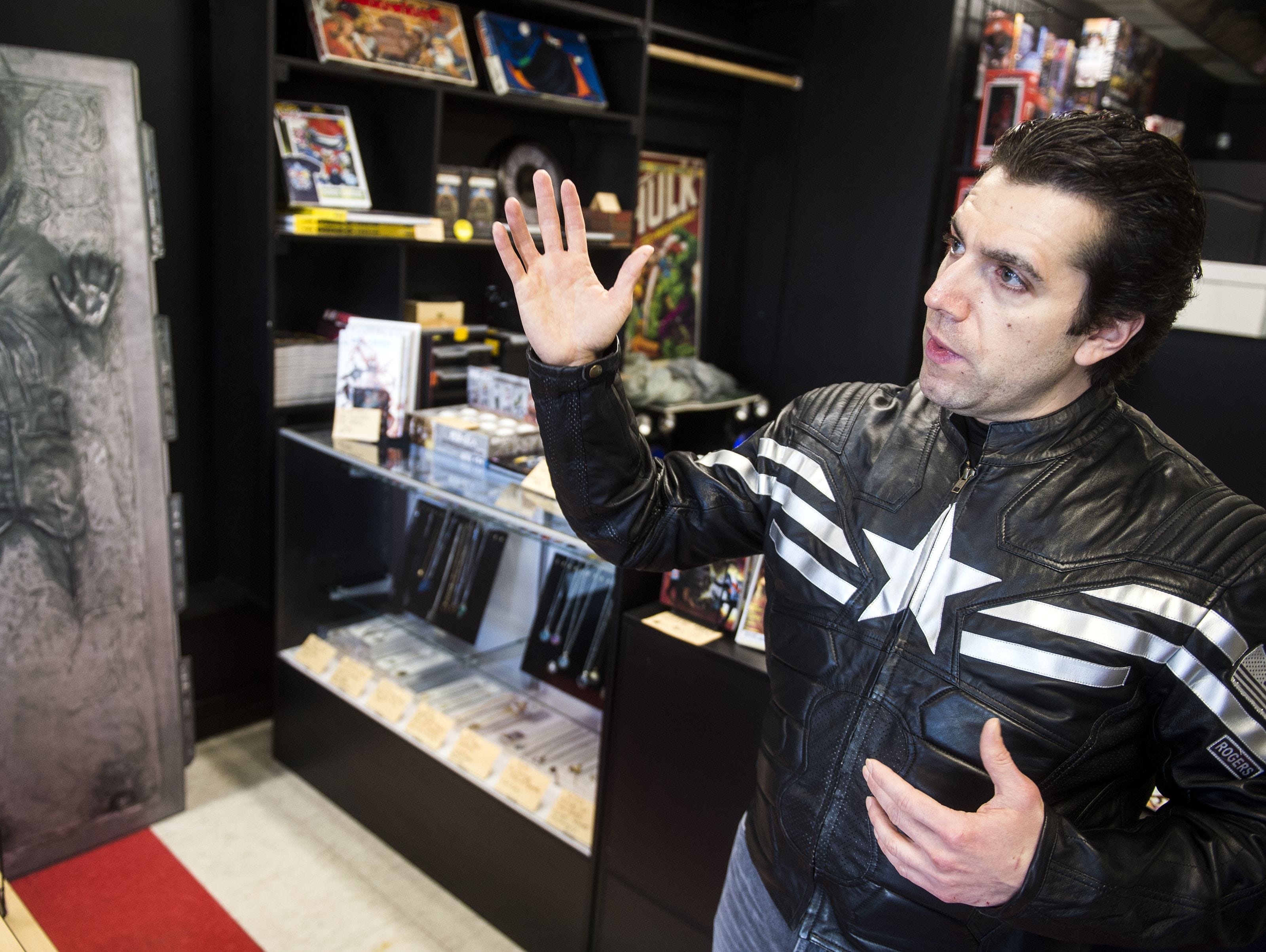 Matthew Madrigale, owner of Kirby Comics on York Street, stands in front of his store while explaining the reason behind naming the store after Jack Kirby, Tuesday, Jan. 9, 2018. Kirby Comics, on York Street, is Hanover's newest comic book store. It opened in December, 2017. 