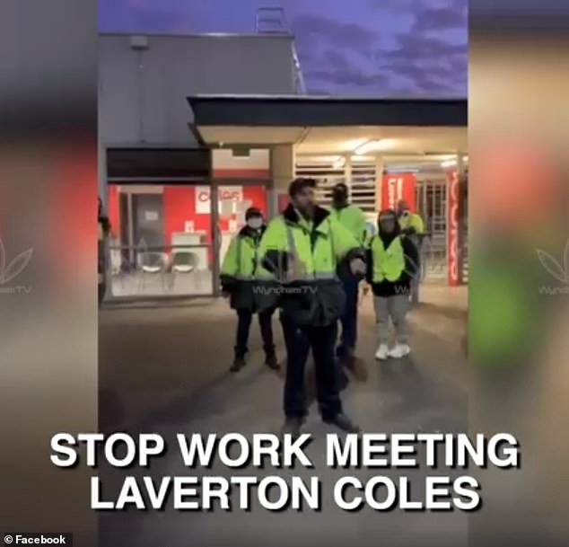 Workers gathered outside the front of the Laverton distribution centre where they demanded proper safety equipment