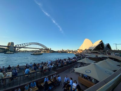 The sun sets at the Sydney Opera House on March 13, 2020.