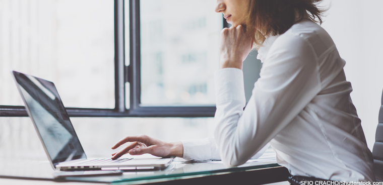 woman at laptop (SFIO CRACHO/Shutterstock.com)