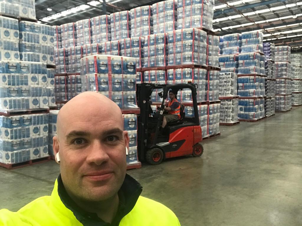 A Millicent factory worker shows just how much toilet paper is left at the mill.