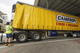 Phil Carey carries out checks on a Cameron truck.
