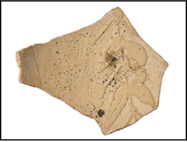 Fragment of decorated egg from the Sanctuary of Apollo at Naukratis  in Egypt.