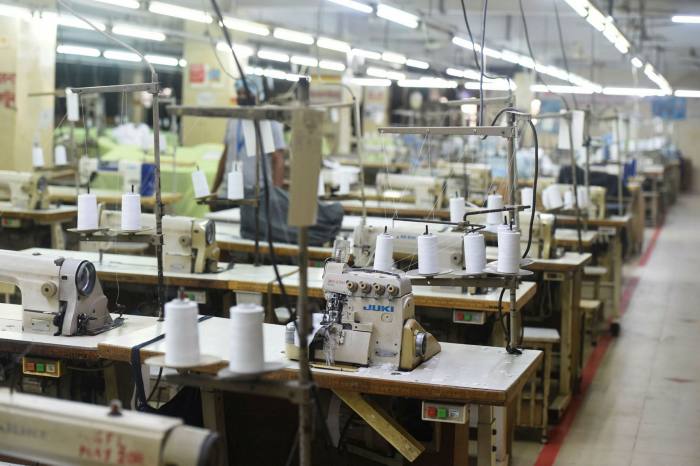 An empty garment factory in Dhaka during the Covid-19 lockdown. Bangladeshi warehouses are overflowing with jeans that producers fear they will never be able to sell