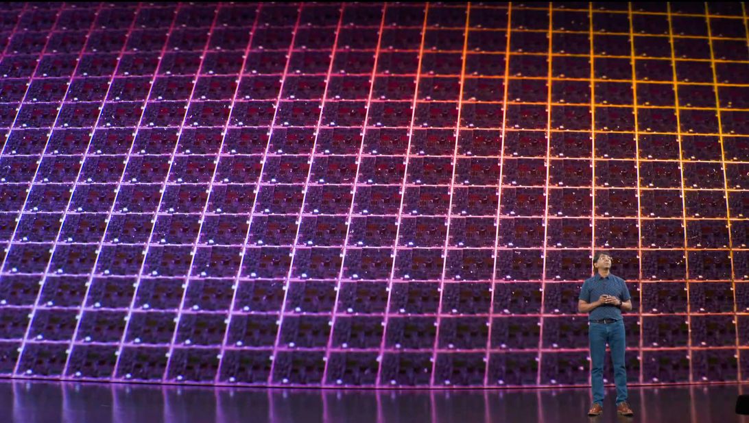 Sri Santhanam, vice president of silicon engineering, shows off Apple's new A13 smartphone chip.