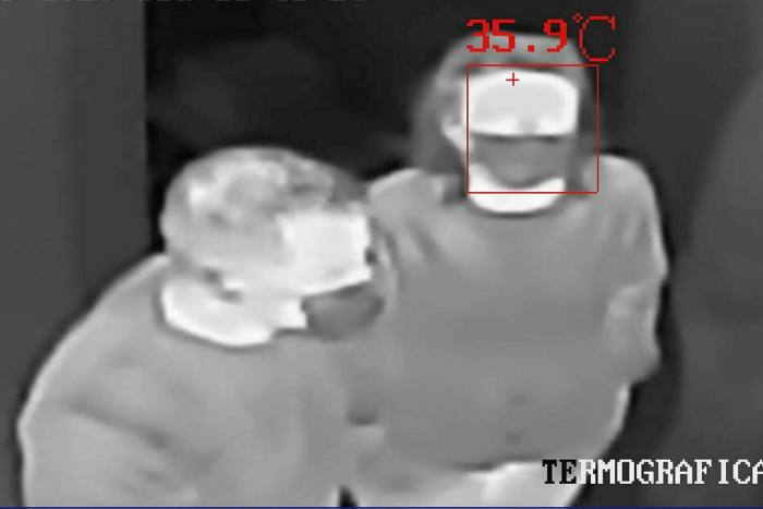 Thermal scanners take employees’ temperatures at the entrance to the PBA factory