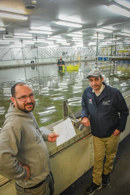 Dr Jean-Roch Nader and Dr Nagi Abdussamie, with PhD candidate Eric Gubesch, testing a wave energy converter at the Australian Maritime College. Picture: Paul Scambler