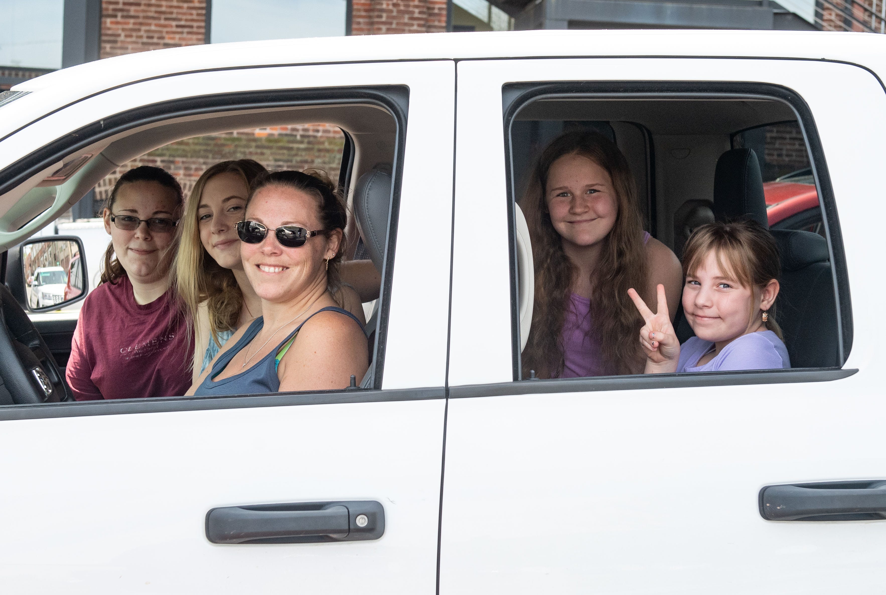 Amy Norman and the rest of her family are very thankful for the Pop-Up Drive-Thru Food Distribution at the John Wright Restaurant Saturday, May 16, 2020.