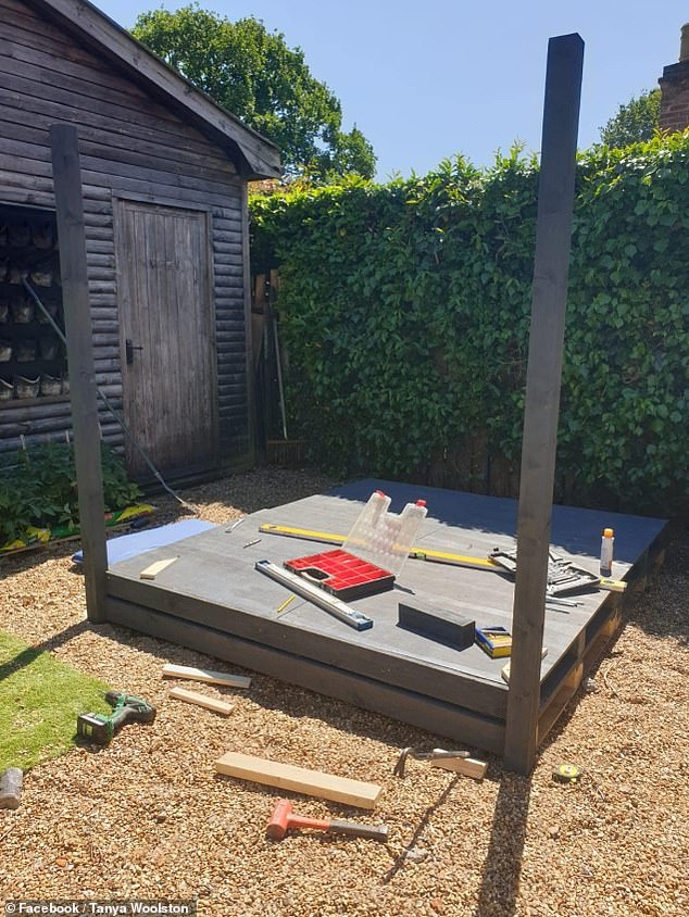 Tanya cut the pallets in order to create the bed's four posts, which she fixed using nails. She covered them in exterior wood stain to protect it from the weather