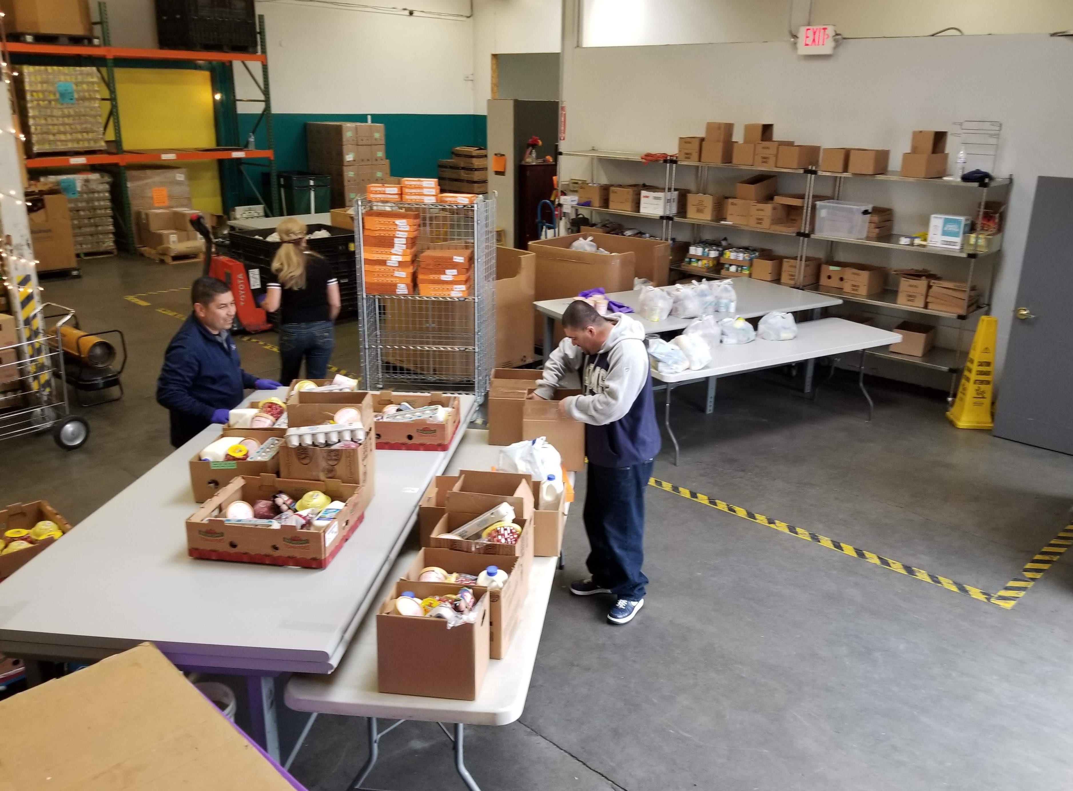 Boxes of food are packed for St. Vincent's Food Pantry of Reno, which serves more than 15,000 people a month.