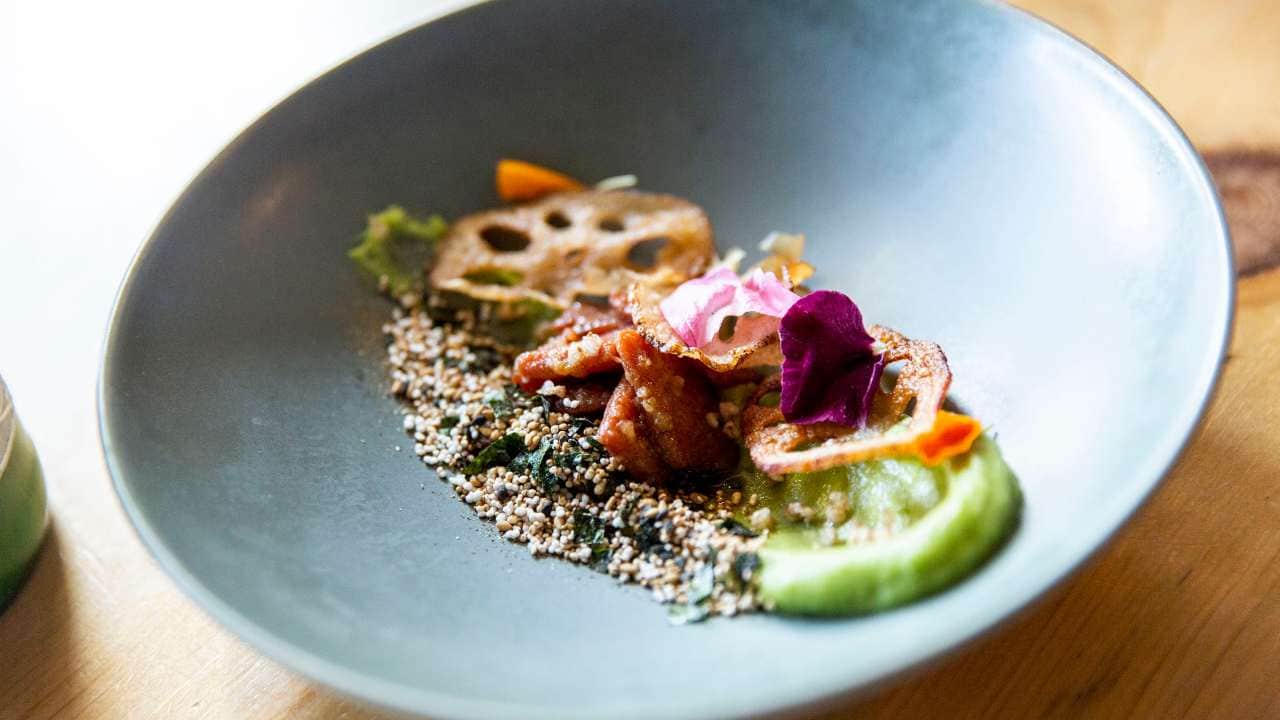 This salmon dish from the tasting menu at Olympia Oyster Bar in Portland, Oregon is made from cultivated salmon and not farmed salmon – the meat is grown from salmon cells. Image: Rachelle Hacmac/Wild Type