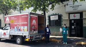 Axalta employees delivering hand sanitizer