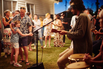 Bobby Alu performs at a backyard gathering for Parlour Gigs.